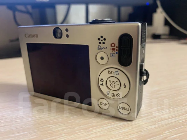 Canon Digital IXUS 70. 7 - 7.9 �� ����