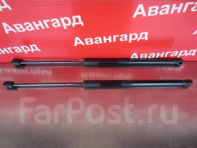 упоры багажника шкода рапид