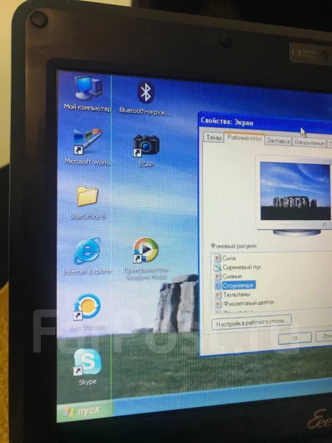 Asus Eee PC. 8.9", 1,6����, ��� 2048 ��, ���� 20���, WiFi: 1, Bluetooth: 1, ����������� �� 2��. ����