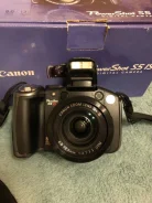 Canon PowerShot S5 IS. 8 - 8.9 ��, ���: 12� ����