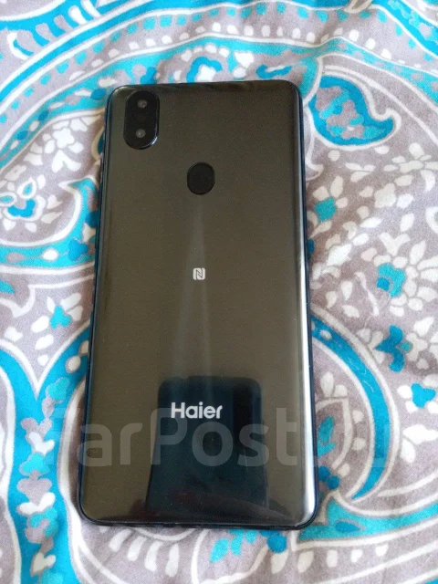 Haier Elegance E11. �/�, ������, 4G LTE, Dual-SIM, NFC ����