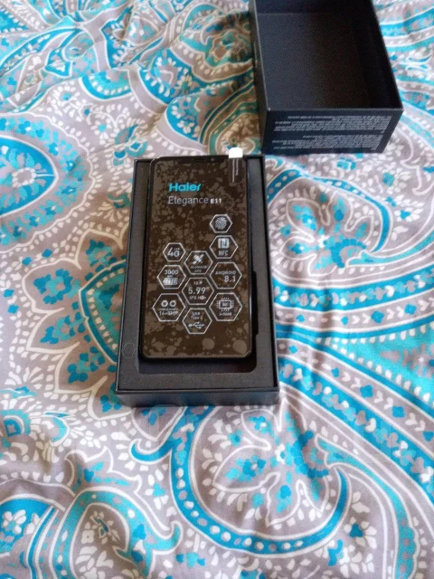 Haier Elegance E11. �/�, ������, 4G LTE, Dual-SIM, NFC ����