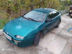 Mazda 323F ����