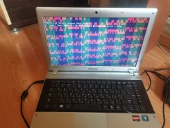 Samsung RV415. 14", 1 600����, ��� 2048 ��, WiFi: 1, Bluetooth: 1, ����������� �� 1��. ����