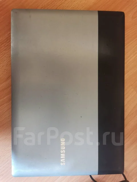 Samsung RV415. 14", 1 600����, ��� 2048 ��, WiFi: 1, Bluetooth: 1, ����������� �� 1��. ����