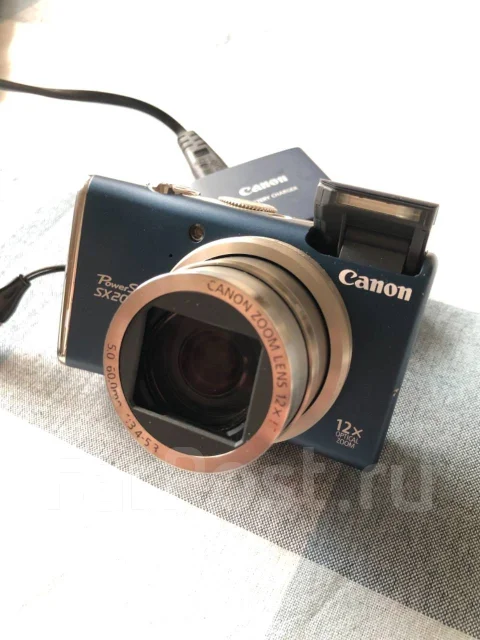 Canon PowerShot SX200 IS. 10 - 14.9 ��, ���: 12� ����