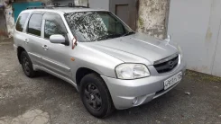 Mazda Tribute. �������, 4wd, 2.0 (129��.�.), ������, 216 935����. �� ����