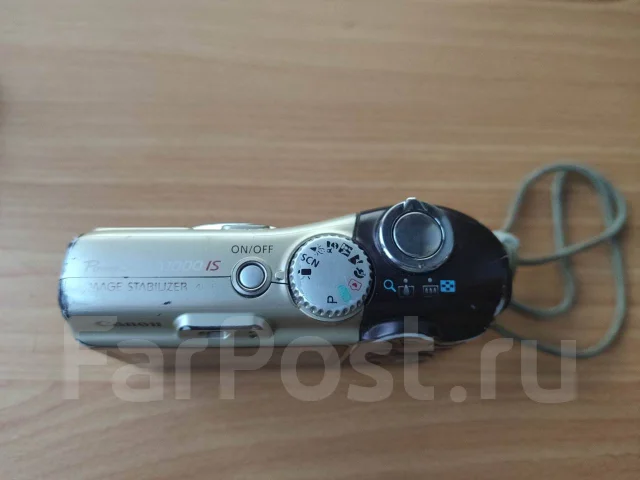 Canon PowerShot A1000 IS. 10 - 14.9 ��, ���: 4� ����