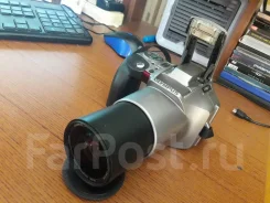 Olympus IS-200. ���: 4� ����