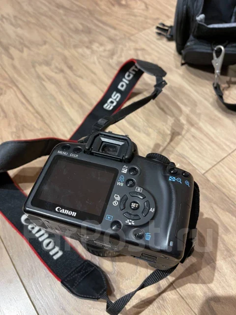 Canon EOS 1000D ����