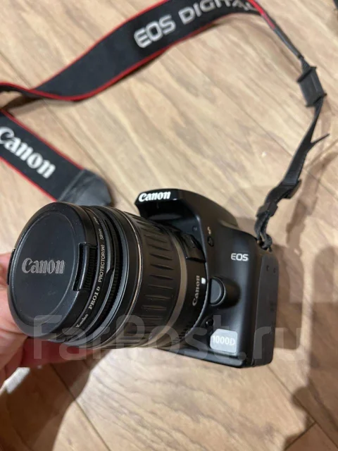 Canon EOS 1000D ����