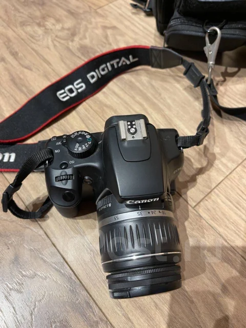 Canon EOS 1000D ����