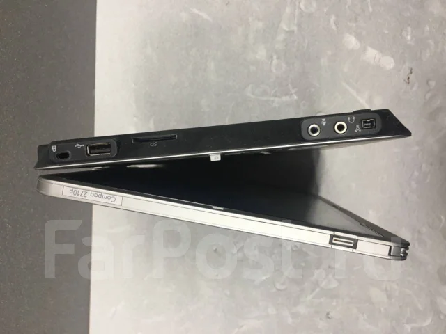 HP Compaq. 12.1", 1,2����, ��� 2048 ��, WiFi: 1, Bluetooth: 1 ����