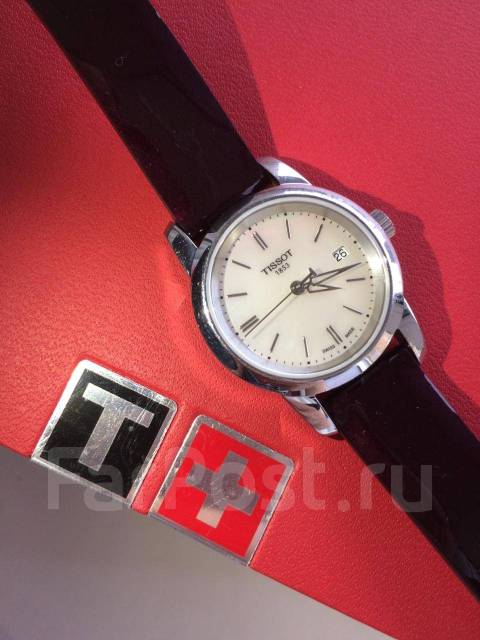 Tissot . 7 000