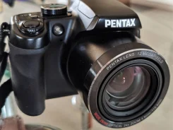 Pentax Optio X70. 10 - 14.9 ��, ���: 14� � ����� ����
