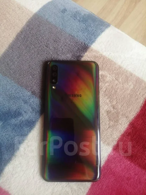 Samsung Galaxy A50. �/�, �������, 3G, 4G LTE, Dual-SIM, NFC ����