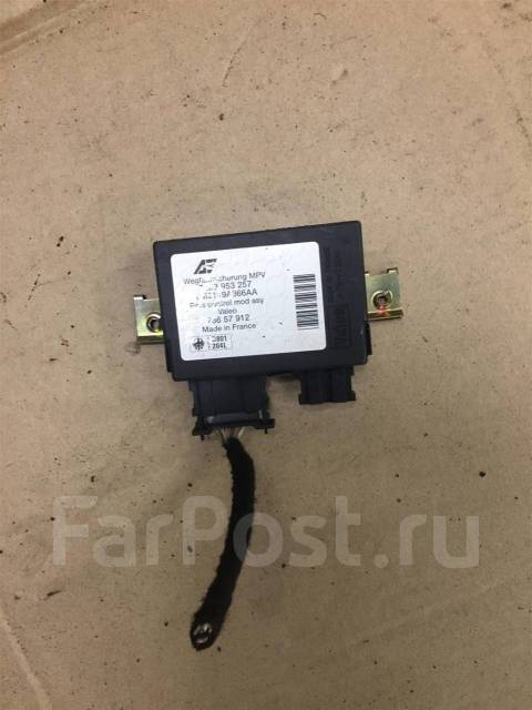 Где находится блок иммобилайзера фольксваген шаран