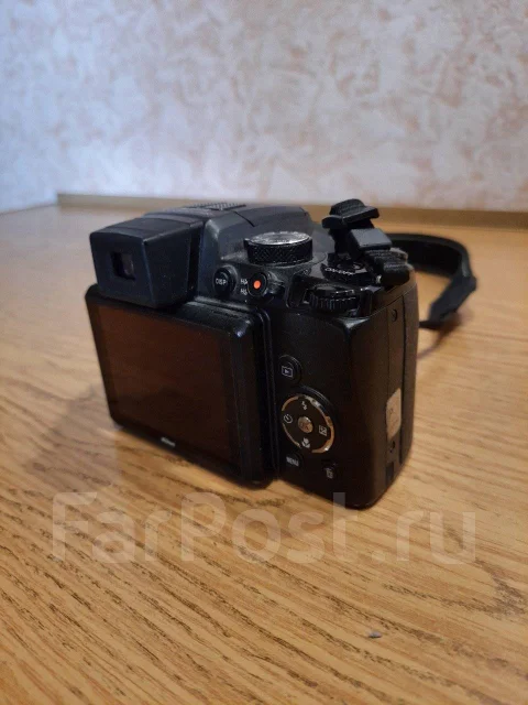 Nikon Coolpix P100. 10 - 14.9 ��, ���: 14� � ����� ����