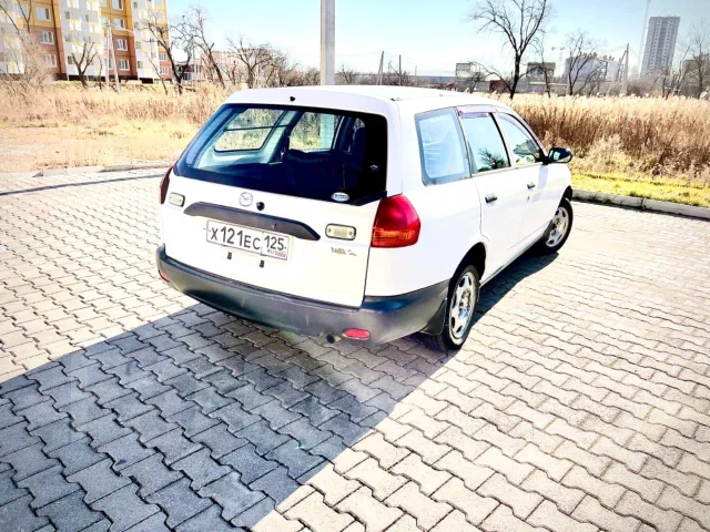 Mazda Familia. �������, 4wd, 1.8 (120��.�.), ������, 184 700����. �� ����