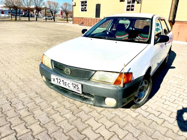 Mazda Familia. �������, 4wd, 1.8 (120��.�.), ������, 184 700����. �� ����
