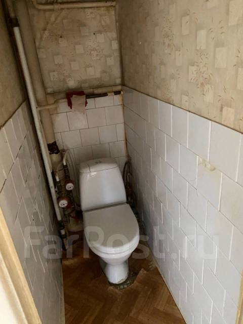 Toilet under wall 2