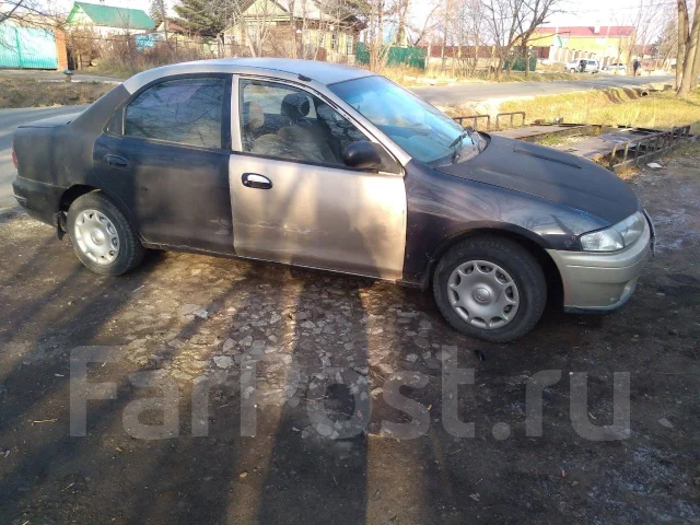 Mazda Familia. ��������, ��������, 1.5 (110��.�.), ������ ����