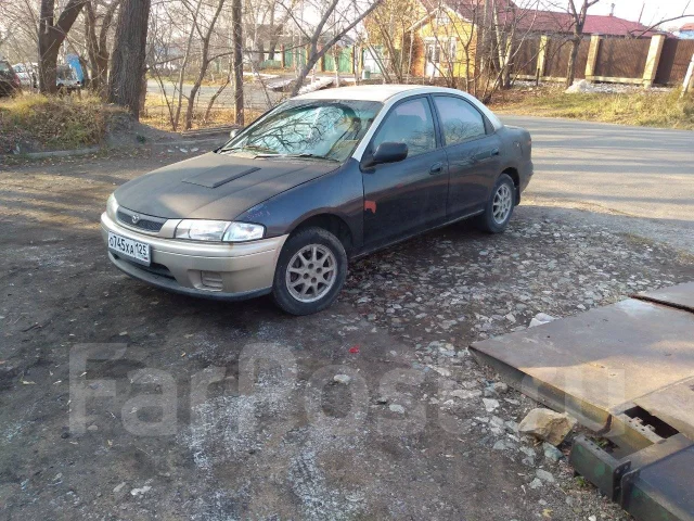 Mazda Familia. ��������, ��������, 1.5 (110��.�.), ������ ����