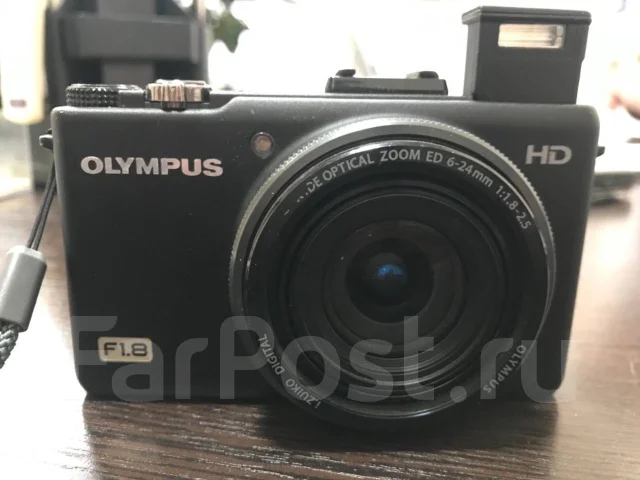Olympus XZ-1. 10 - 14.9 ��, ���: 14� � ����� ����