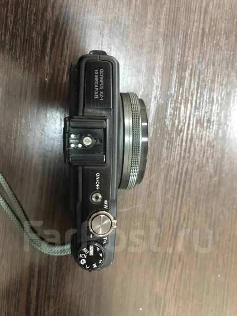 Olympus XZ-1. 10 - 14.9 ��, ���: 14� � ����� ����
