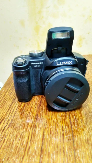Panasonic Lumix DMC-FZ8. 7 - 7.9 ��, ���: 12� ����