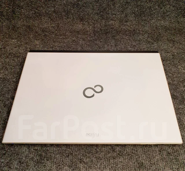 Fujitsu. 13.3", 2,6����, ��� 4 ��, ���� 750���, WiFi: 1, Bluetooth: 1, ����������� �� 6��. ����