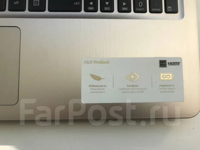 Asus VivoBook 15. 15.6", 2,3����, ��� 4 ��, ���� 256���, WiFi: 1, Bluetooth: 1, ����������� �� 4��. ����