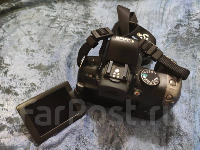 Canon PowerShot SX20 IS. 10 - 14.9 �� ����