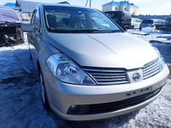 Nissan Tiida Latio. CS11, HR15 ����