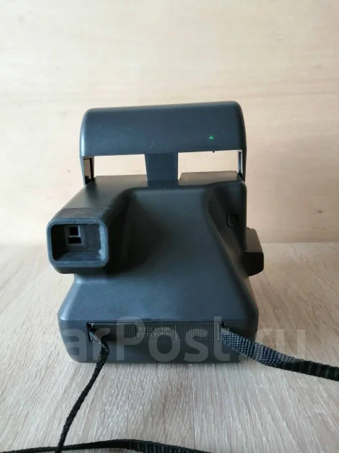 Polaroid OneStep. 4 - 4.9 �� ����