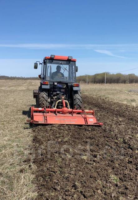 Вспашка земли трактором в Хабаровске
