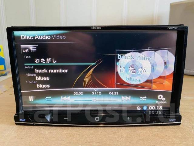 Clarion NX702 ����
