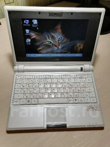 Asus Eee PC. 7", 900����, ��� 2048 ��, ���� 4���, WiFi: 1, Bluetooth: 1, ����������� �� 1��. ����