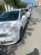 Nissan Tiida Latio. �������, 4wd, 1.5 (109��.�.), ������, 143 350����. �� ����