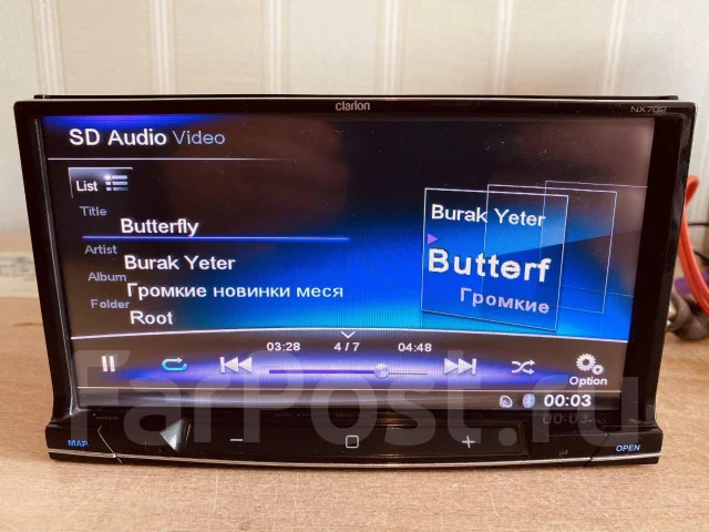 Clarion NX702 ����