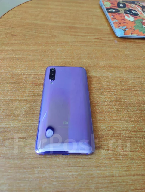 Xiaomi Mi9. �/�, �������, 4G LTE, Dual-SIM, NFC ����
