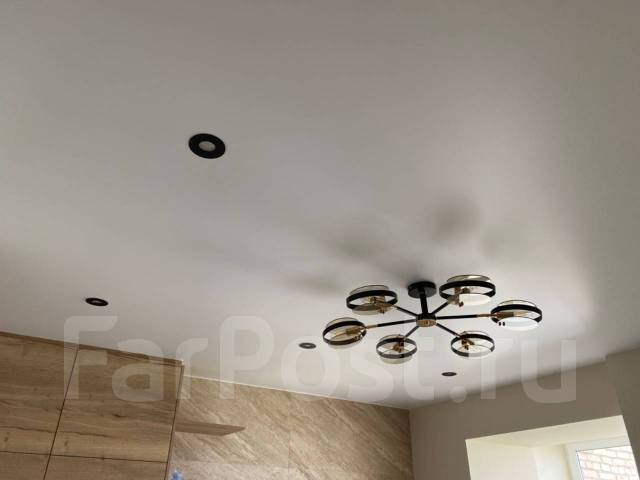 Демонтаж натяжных потолков. Слив воды во Владивостоке