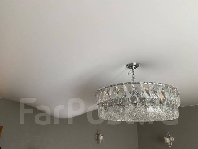 Демонтаж натяжных потолков. Слив воды во Владивостоке