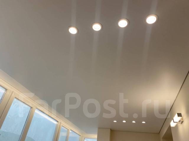 Демонтаж натяжных потолков. Слив воды во Владивостоке