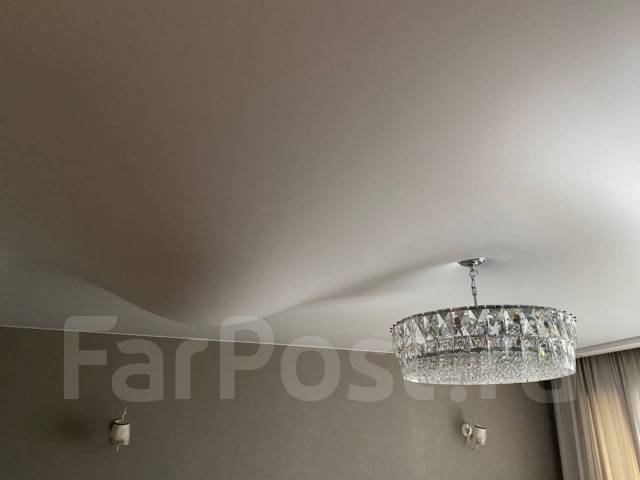 Демонтаж натяжных потолков. Слив воды во Владивостоке