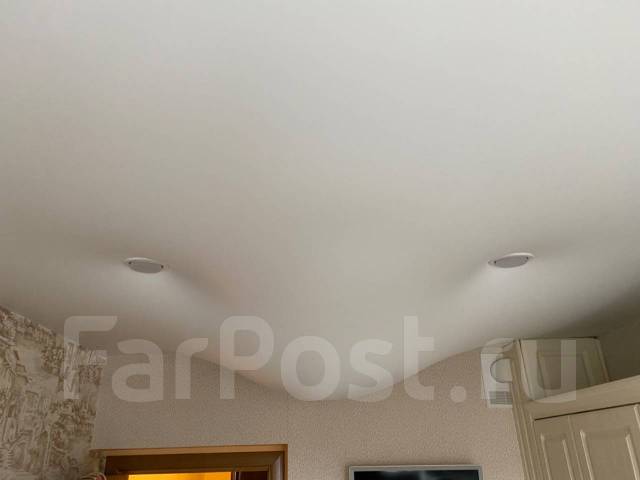 Демонтаж натяжных потолков. Слив воды во Владивостоке