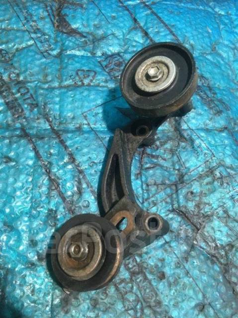 кронштейн натяжителя крузак 200 дизель. успокоитель ремня приводного ленд крузер 200. натяжитель ремня ленд крузер 200. 1662051011 натяжитель. ролик натяжитель тойота ленд крузер 200.