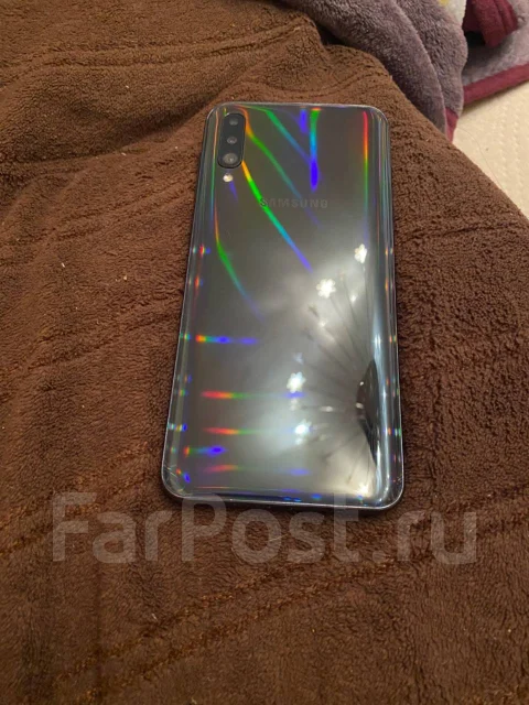 Samsung Galaxy A50. �/�, 3G, 4G LTE, Dual-SIM, NFC ����