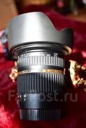 Tamron.   77  