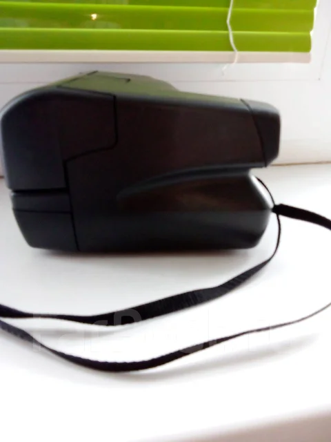 Polaroid OneStep. ���: 14� � ����� ����